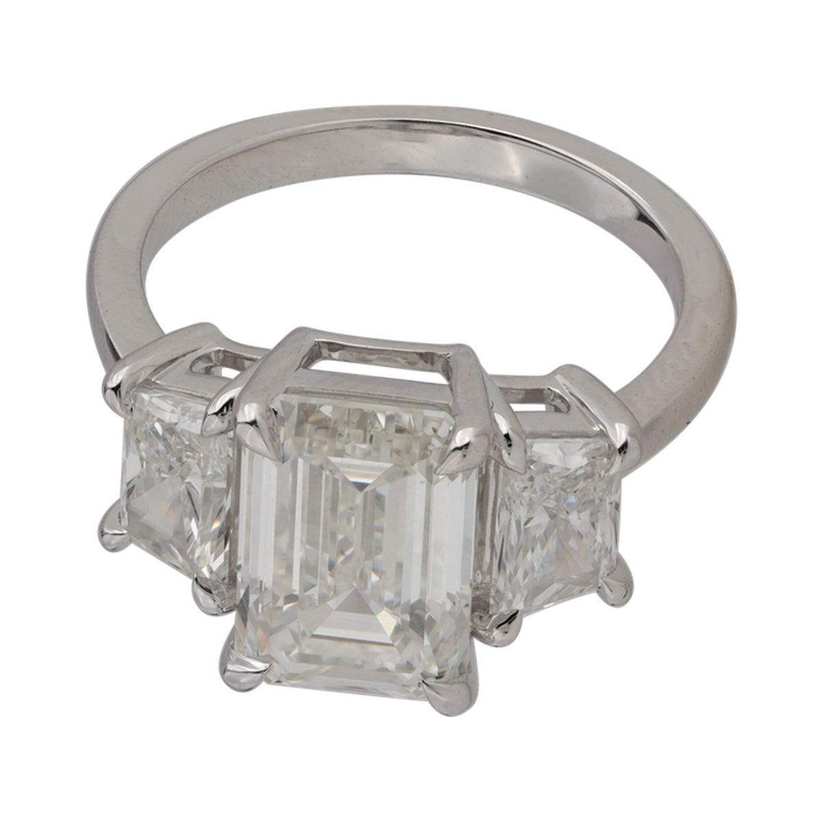 Step-Cut Three-Stone Ring — authentic catalog photograph on white