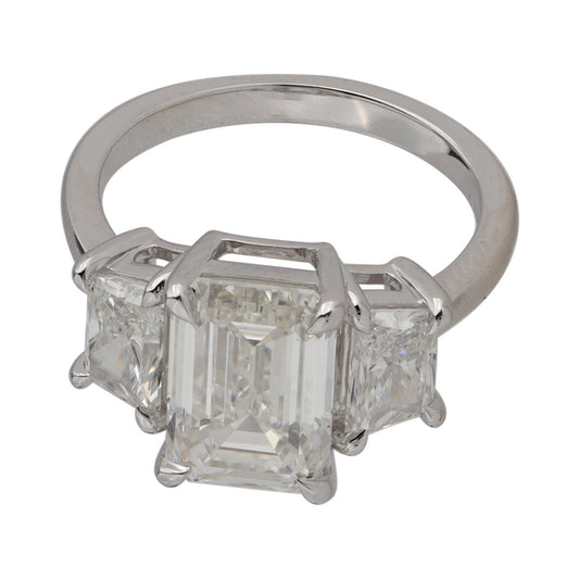 Step-Cut Three-Stone Ring — authentic catalog photograph on white