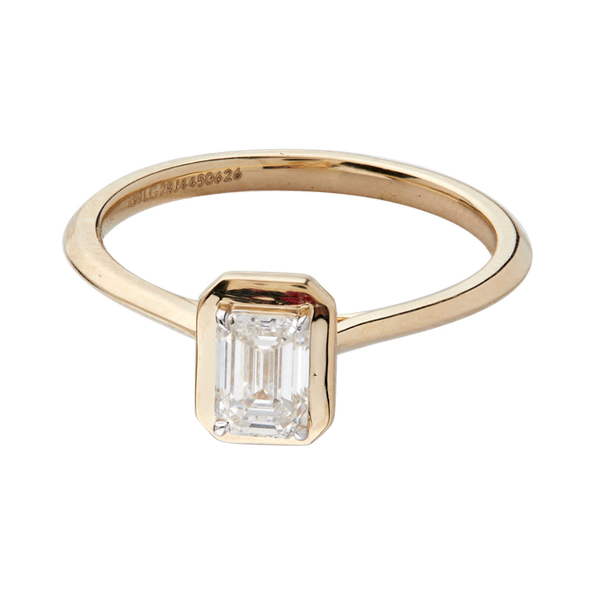 Emerald Bezel Solitaire Ring — authentic catalog photograph on white