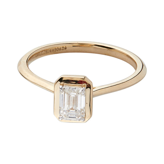 Emerald Bezel Solitaire Ring — authentic catalog photograph on white